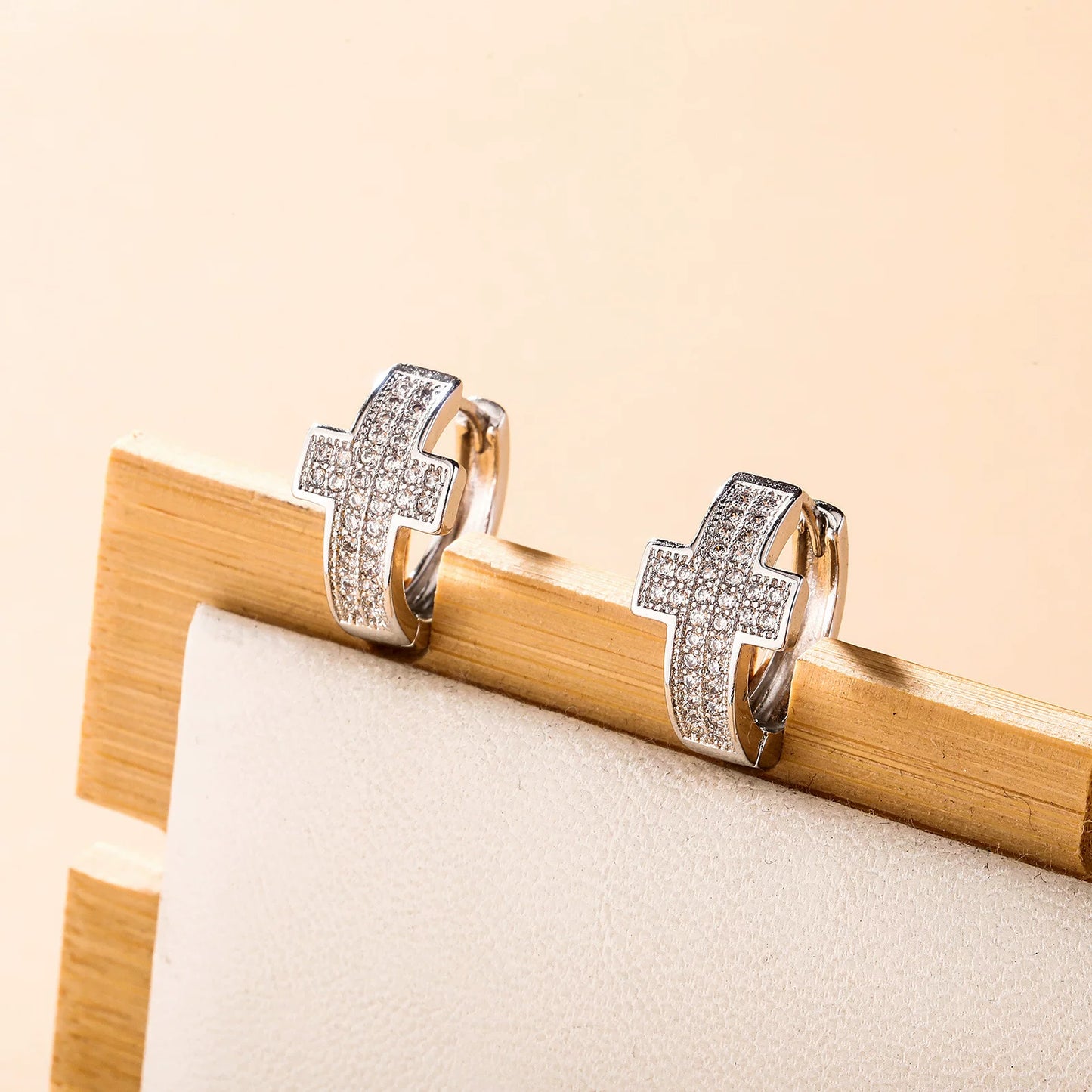 The Cross Huggie Hoops